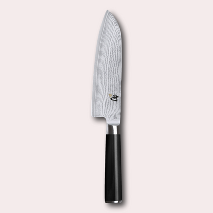 KAI Shun 18cm Santoku knife left handed.  Damascus blade with razor sharp edge and black pakkawood handle. 