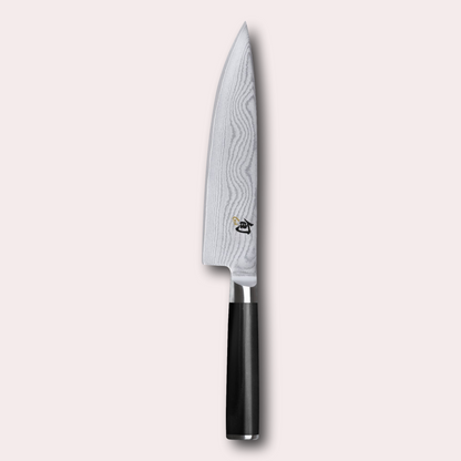 KAI Shun 20cm Chef knife left handed.  Damascus blade with razor sharp edge and black pakkawood handle. 