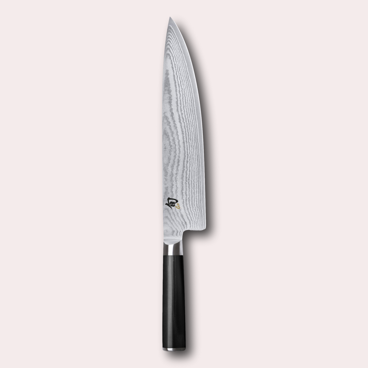 KAI Shun 25cm chef Knife , damascus blade with razor sharp edge and black pakkawood handle. 