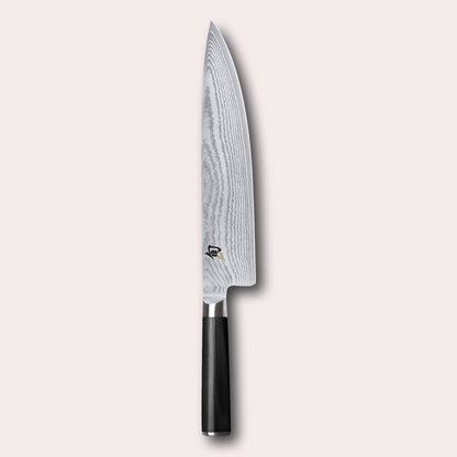 KAI Shun 25cm chef Knife , damascus blade with razor sharp edge and black pakkawood handle. 