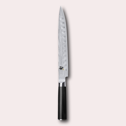KAI Shun 23cm hollow edge slicing Knife , damascus blade with razor sharp edge and black pakkawood handle. 
