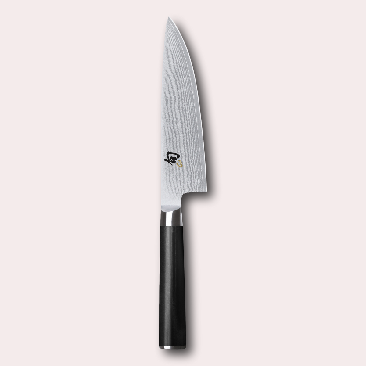 KAI Shun 15cm chef knife , damascus blade with razor sharp edge and black pakkawood handle. 