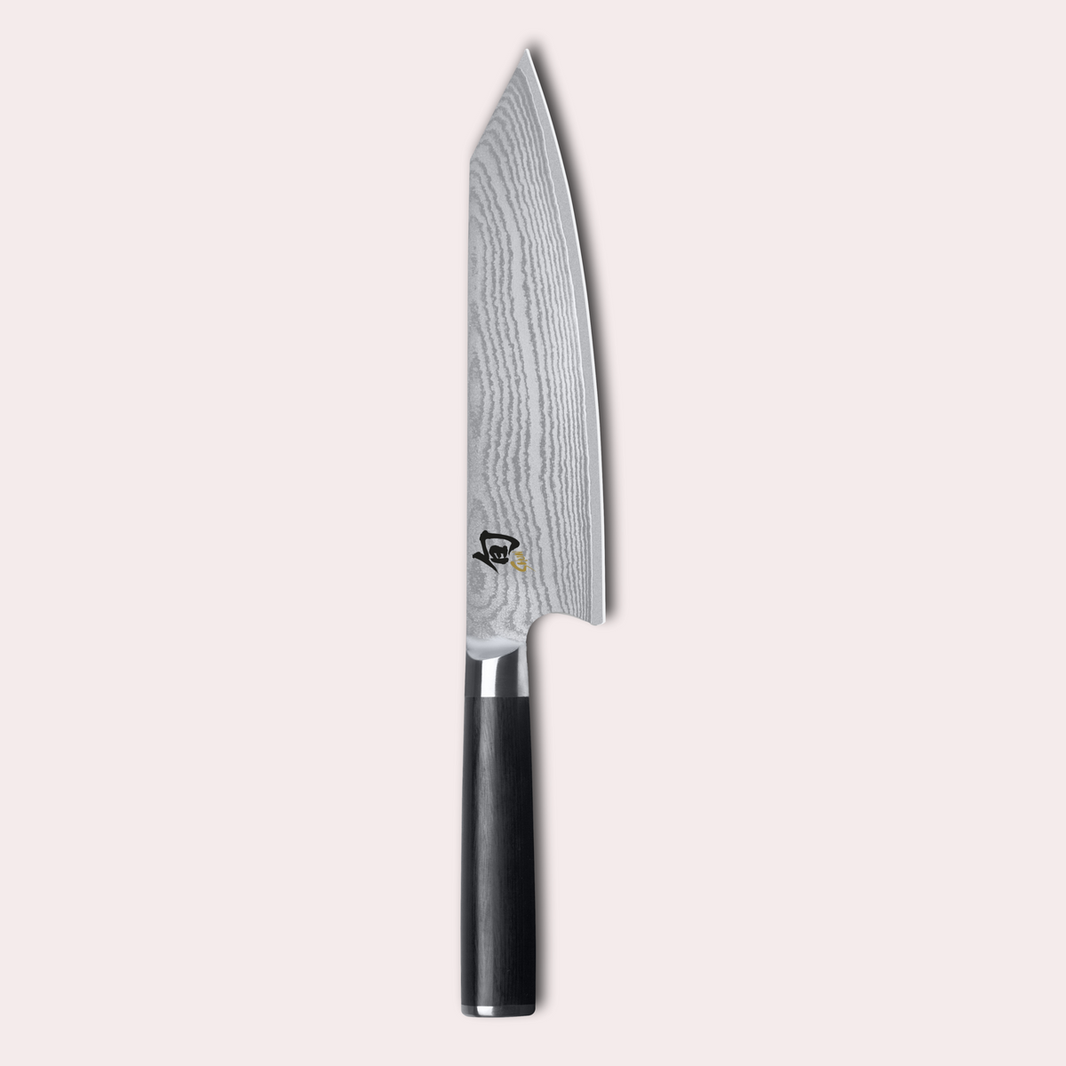 KAI Shun classic kiritsuke knife. Damascus blade with razor sharp edge and black pakkawood handle. 