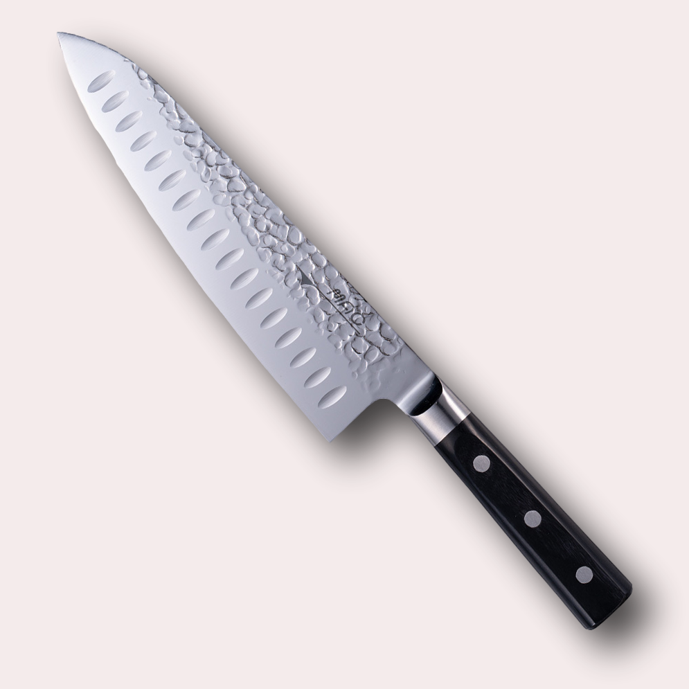 MAC Nashiji chef knife, hammered blade, half bolster and black pakkawood handle.