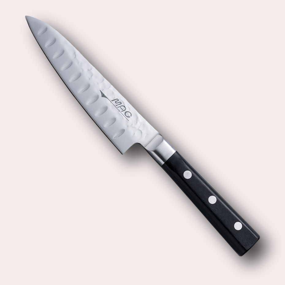 MAC Nashiji paring knife, hammered blade, half bolster and black pakkawood handle.